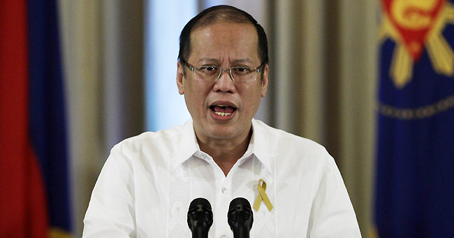 Philippine President Benigno Aquino III makes an announcement on national television at the Malacanang presidential palace in Manila, Philippines on Sunday Oct. 7, 2012. Aquino said Sunday that his government has reached a preliminary peace agreement with the nation's largest Muslim rebel group in a major breakthrough toward ending a decades-long insurgency in the country's south.(AP Photo/Aaron Favila)