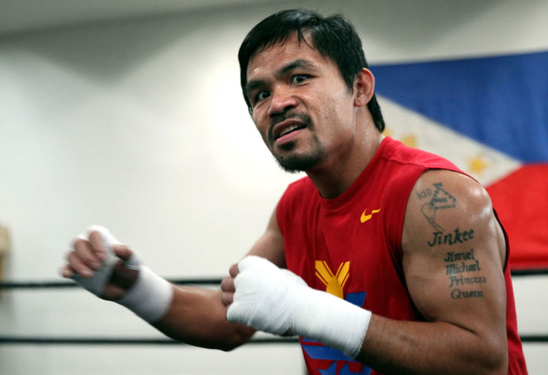 March 10, 2015, Hollywood ,Calif. --- Superstar Manny Pacquiao works out at the Wild Card Boxing Club for his upcoming 12-round welterweight world championship unification mega-fight against Floyd Mayweather , promoted by Mayweather Promotions and Top Rank Inc. The pay-per-view telecast will be co-produced and co-distributed by HBO Pay-Per-View® and SHOWTIME PPV® Saturday, May 2 beginning at 9:00 p.m. ET/ 6:00 p.m. PT from the MGM Grand Garden Arena in Las Vegas. Mayweather & Pacquiao will hold a Red Carpet press conference Wednesday,March 11 at the Nokia Theatre in Los Angeles. --- Photo Credit : Chris Farina - Top Rank (no other credit allowed) copyright 2015