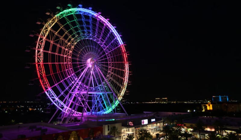 The Orlando Eye observation wheel lights up in rainbow colors Sunday night, June 12, 2016, to remember the people killed and injured in the Pulse nightclub shooting, the deadliest mass shooting in U.S. history. (Joshua Lim/Orlando Sentinel via AP)