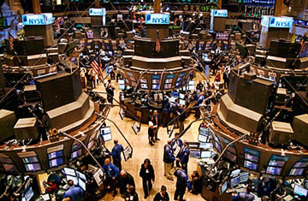 FILE - In this Nov. 27, 2009 file photo, traders move about the floor of the New York Stock Exchange shortly before the opening bell in New York. The stock market rose modestly in afternoon trading Thursday, Jan. 14, 2010, after the government said businesses increased inventories by a larger-than-expected amount in November. (AP Photo/Peter Morgan, File)