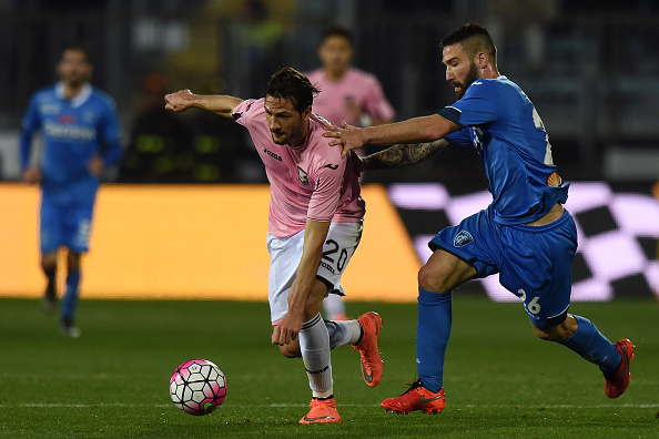 EMPOLI, ITALY - MARCH 19:  Franco Vazquez (L) of Palermo is challenged by Lorenzo Tonelli of Empoli during the Serie A match between Empoli FC and US Citta di Palermo at Stadio Carlo Castellani on March 19, 2016 in Empoli, Italy.  (Photo by Tullio M. Puglia/Getty Images)