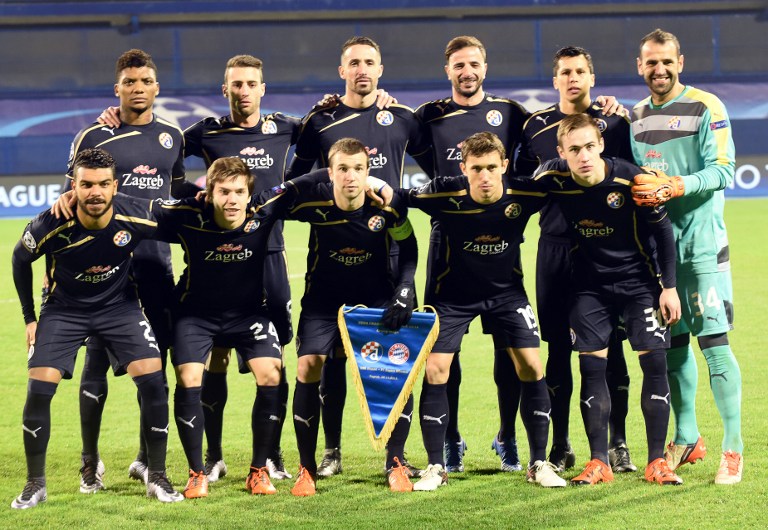 (From top L) Dinamo Zagreb's Chilean forward Junior Fernandes, Portuguese defender Ivo Pinto, French defender Jeremy Taravel, Portuguese midfielder Goncalo Santos, Argentinean defender Leonardo Sigali, Portuguese goalkeeper Eduardo, (from bottom L) Algerian forward El Arabi Hilal Soudani, midfielder Ante Coric, midfielder Domagoj Antolic, midfielder Josip Pivaric and midfielder Marko Rog pose before the UEFA Champions League football match between Dinamo Zagreb v Bayern Munich at the Maksimir stadium in Zagreb on December 9, 2015. AFP PHOTO / DENIS LOVROVIC / AFP PHOTO / DENIS LOVROVIC