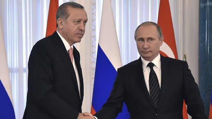 erdogan-putin-manos