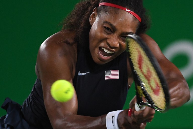 USA's Serena Williams returns the ball to France's Alize Cornet during their women's second round singles tennis match at the Olympic Tennis Centre of the Rio 2016 Olympic Games in Rio de Janeiro on August 8, 2016. / AFP PHOTO / Roberto SCHMIDT