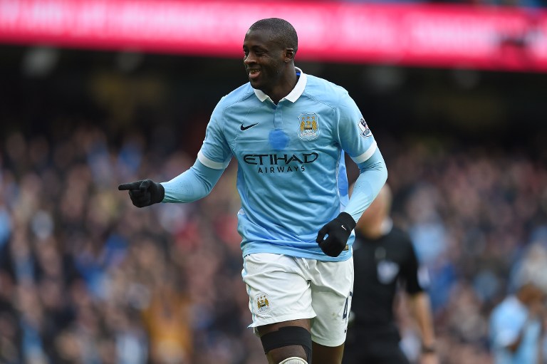 Manchester City's Ivorian midfielder and captain Yaya Toure celebrates scoring his team's first goal during the English Premier League football match between Manchester City and Aston Villa at the Etihad Stadium in Manchester, north west England, on March 5, 2016. / AFP PHOTO / PAUL ELLIS / RESTRICTED TO EDITORIAL USE. No use with unauthorized audio, video, data, fixture lists, club/league logos or 'live' services. Online in-match use limited to 75 images, no video emulation. No use in betting, games or single club/league/player publications. /