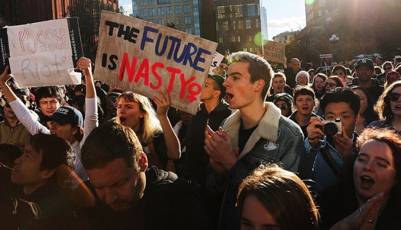 NEW YORK, NY - NOVEMBER 11: Hundreds of anti-Donald Trump protesters hold a demonstration in Washington Square Park as New Yorkers react to the election of Donald Trump as president of the United States on November 11, 2016 in New York City. The election of Trump as president has sparked protests in cities across the country. Spencer Platt/Getty Images/AFP == FOR NEWSPAPERS, INTERNET, TELCOS & TELEVISION USE ONLY ==