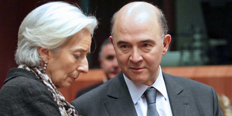©OLIVIER HOSLET/EPA/MAXPPP - epa03639663 French Finance Minister Pierre Moscovici (R) chats with International Monetary Fund (IMF) Managing Director Christine Lagarde prior to special Eurogroup Finance Ministers meeting on Cyprus crisis at the EU headquarters in Brussels, Belgium, 24 March 2013. Eurozone finance ministers were bracing themselves Sunday for a long night of negotiations to reach an 11th-hour deal on a bailout for Cyprus, before the country's financial lifeline is cut off. Cyprus is under pressure to finalize its contribution under an international bailout, needed to shore up its troubled banking sector and struggling economy.  EPA/OLIVIER HOSLET *** FRANCE ONLY ***